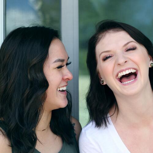 two female friends laughing